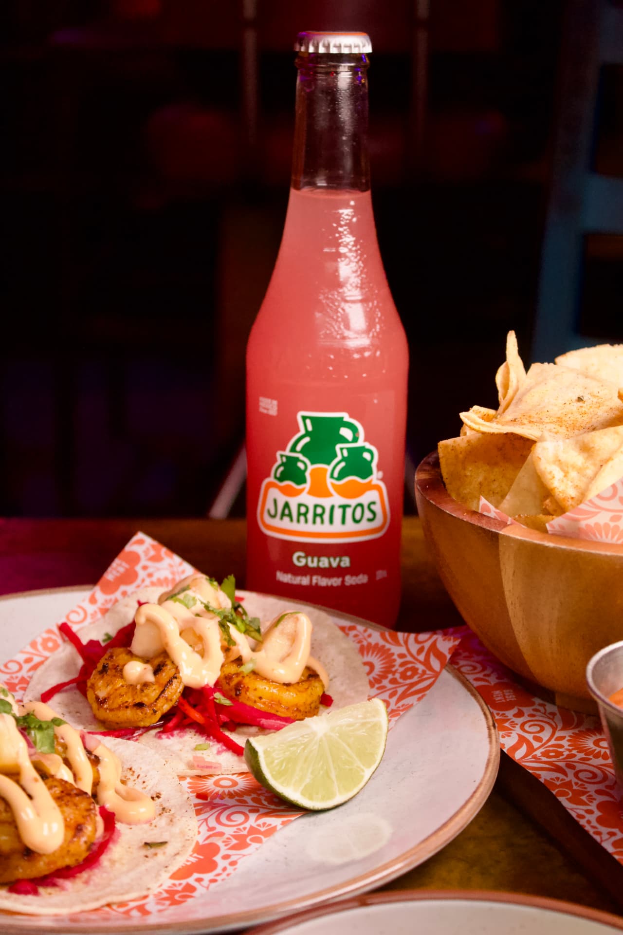 Prawn tacos with a guava Jarritos